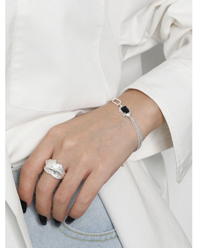 Layered Gold Link Bracelet With Black Zirconia