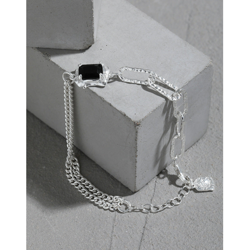 Layered Gold Link Bracelet With Black Zirconia