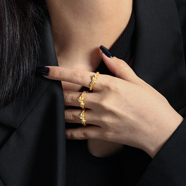 IRREGULAR TEXTURED SILVER RING WITH ZIRCON STONE