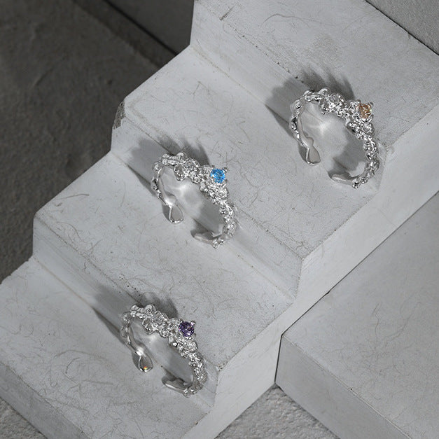 IRREGULAR TEXTURED SILVER RING WITH ZIRCON STONE