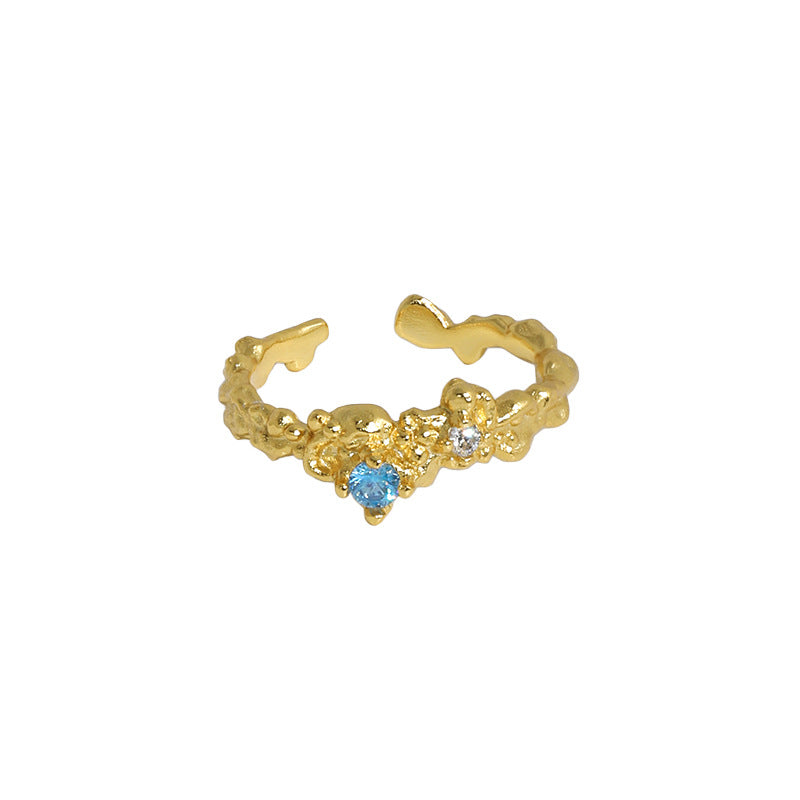 IRREGULAR TEXTURED SILVER RING WITH ZIRCON STONE